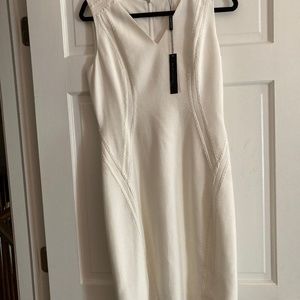 Ellie Tahari cotton dress with trim in front and back. Great for a summer event.